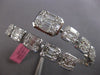 EXTRA LARGE 6.07CT DIAMOND 18KT WHITE GOLD ROUND & BAGUETTE 3D BANGLE BRACELET