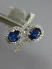 WIDE 1.23CT DIAMOND & AAA SAPPHIRE 18KT WHITE GOLD OVAL & ROUND CRISS CROSS RING