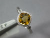 .80CT DIAMOND & AAA CITRINE 14KT WHITE GOLD CUSHION & ROUND 3 STONE BEZEL RING