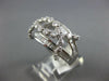 ESTATE WIDE 2.99CT DIAMOND 18KT WHITE GOLD ROUND & BAGUETTE INFINITY LOVE RING