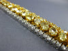 EXTRA LARGE 28.26CT WHITE & FANCY YELLOW DIAMOND 18K 2 TONE GOLD TENNIS BRACELET