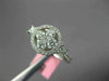 ESTATE .82CT DIAMOND 18K WHITE GOLD 3D ROUND & PRINCESS 4 STONE FLOWER HALO RING