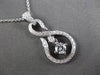 ESTATE .25CT DIAMOND 18KT WHITE GOLD SOLITAIRE INFINITY FLOATING PENDANT & CHAIN
