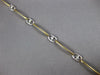 ESTATE .20CT DIAMOND 18KT 2 TONE GOLD OVAL LINK BY THE YARD LOVE TENNIS BRACELET