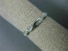 ESTATE .15CT DIAMOND 14KT WHITE GOLD 3D INFINITY SEMI ETERNITY ANNIVERSARY RING