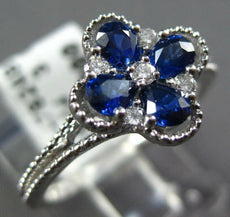 .84CT DIAMOND & AAA SAPPHIRE 18KT WHITE GOLD ROUND & PEAR SHAPE FLOWER LOVE RING