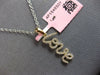 ESTATE .16CT DIAMOND 14KT YELLOW GOLD 3D CLASSIC SCRIPT LOVE FLOATING PENDANT