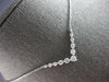 .59CT DIAMOND 14KT WHITE GOLD 3D GRADUATING V SHAPE SHARED PRONG LOVE NECKLACE