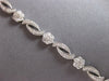 ESTATE 3.10CT DIAMOND 14KT WHITE GOLD MULTI FLOWER INFINITY LOVE TENNIS BRACELET