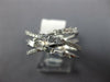 .68CT DIAMOND 14KT WHITE GOLD 3D ROUND & BAGUETTE MULTI ROW CRISS CROSS FUN RING
