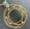 ESTATE LARGE .18CT DIAMOND 18KT 2 TONE GOLD CIRCULAR FLOWER ETOILE MESH PENDANT
