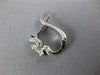 ESTATE .74CT DIAMOND 18KT WHITE GOLD 3D SOLITAIRE ETOILE HUGGIE EARRINGS #284