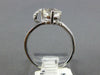 ESTATE 1.33CT DIAMOND & AAA WHITE TOPAZ 14KT WHITE GOLD LOVE KNOT SOLITAIRE RING
