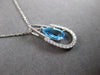 .77CT DIAMOND & AAA BLUE TOPAZ 14KT WHITE GOLD PEAR SHAPE & ROUND LUCKY PENDANT