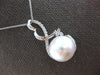 LARGE .36CT DIAMOND & SOUTH SEA PEARL 18KT WHITE GOLD LOVE KNOT FLOATING PENDANT