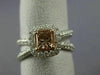 ESTATE 1.24CT WHITE & BROWNISH ORANGE DIAMOND 18KT WHITE & ROSE GOLD LOVE RING