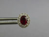 1CT DIAMOND & AAA RUBY 18KT WHITE GOLD OVAL & ROUND FLOWER CLASSIC STUD EARRINGS