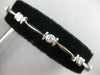 ESTATE .4CT DIAMOND 14K WHITE GOLD BEZEL ETOILE BY THE YARD LOVE TENNIS BRACELET