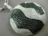 LARGE 4.51CT WHITE & BLACK DIAMOND 18KT WHITE & BLACK GOLD CIRCULAR WAVE PENDANT