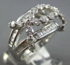 ESTATE WIDE 2.99CT DIAMOND 18KT WHITE GOLD ROUND & BAGUETTE INFINITY LOVE RING