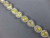 EXTRA LARGE 19.42CT WHITE & FANCY YELLOW DIAMOND 18KT WHITE GOLD TENNIS BRACELET