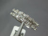 ESTATE 1.0CT DIAMOND 18KT WHITE GOLD ROUND & BAGUETTE INVISIBLE ANNIVERSARY RING