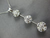 1.06CT DIAMOND 14KT WHITE GOLD FLOWER PAST PRESENT FUTURE JOURNEY LOVE PENDANT