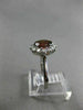 ESTATE 1.45CT DIAMOND & NATURAL GARNET 18KT WHITE GOLD OVAL HALO ENGAGEMENT RING