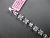 4.22CT DIAMOND 18KT WHITE GOLD ROUND BAGUETTE & MARQUISE SQUARE TENNIS BRACELET