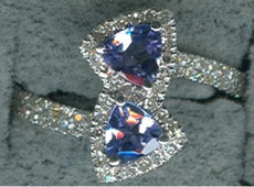 .80CT DIAMOND & AAA TANZANITE 14KT WHITE GOLD TRILLION & ROUND CRISS CROSS RING