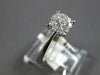 ESTATE .34CT DIAMOND 18KT WHITE GOLD ROUND 3D CLUSTER INVISIBLE ENGANGEMENT RING