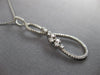 ESTATE LARGE .42CT DIAMOND 14KT WHITE GOLD 3D INFINITY FLOWER FLOATING PENDANT