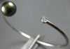.06CT DIAMOND & AAA TAHITIAN PEARL 14KT WHITE GOLD 3D SOLITAIRE BANGLE BRACELET
