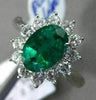 ANTIQUE LARGE 2.14CT DIAMOND & AAA COLOMBIAN EMERALD PLATINUM CLUSTER OVAL RING