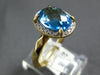 2.57CT DIAMOND & AAA BLUE TOPAZ 14KT YELLOW GOLD 3D OVAL HALO CLASSIC FUN RING