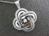 ESTATE LARGE 1.16CT DANCING DIAMOND 14KT WHITE GOLD 3D LOVE KNOT FLOWER PENDANT