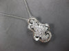 EXTRA LARGE 2.55CT DIAMOND 18KT WHITE GOLD ROUND & BAGUETTE FLORAL LOVE PENDANT