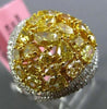 ESTATE 18KT WHITE AND YELLOW GOLD ANNIVERSARY RING. 3D DOUBLE HALO DESIGN