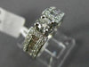 ESTATE .90CT ROUND & BAGUETTE DIAMOND 14KT WHITE GOLD FOUR PRONG ENGAGEMENT RING