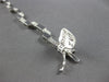 ESTATE .80CT DIAMOND 14KT WHITE GOLD ROUND GEOMETRICAL TRAPEZOID TENNIS BRACELET