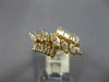1.0CT DIAMOND 14KT YELLOW GOLD MARQUISE & BAGUETTE CRISS CROSS ANNIVERSARY RING