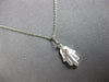 SMALL .04CT DIAMOND 14KT WHITE GOLD MATTE & SHINY HAMSA CHAMSA FLOATING PENDANT