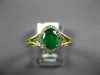 ESTATE .95CT DIAMOND & AAA OVAL EMERALD 14KT YELLOW GOLD CLASSIC ENGAGEMENT RING
