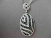 ESTATE LARGE 5.18CT BLACK & WHITE DIAMOND 18KT WHITE GOLD OVAL FLOATING NECKLACE