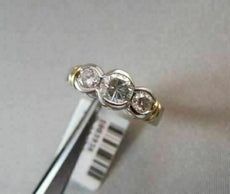 ESTATE WIDE 1.20CTW PLATINUM & 18KT YELLOW GOLD PAST PRESENT FUTURE DIAMOND RING