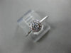 ESTATE .15CT DIAMOND 18KT WHITE GOLD CLASSIC FLOWER HALO BEZEL FRIENDSHIP RING