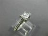 ESTATE .66CT ROUND & PRINCESS DIAMOND 14KT WHITE GOLD SOLITAIRE ENGAGEMENT RING