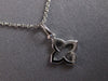 ESTATE SMALL .08CT DIAMOND 14KT WHITE GOLD 3D FLOWER STAR FLOATING PENDANT
