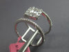 LARGE .76CT WHITE DIAMOND 18KT WHITE GOLD 3D ROUND & BAGUETTE ANNIVERSARY RING