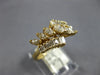 1.0CT DIAMOND 14KT YELLOW GOLD MARQUISE & BAGUETTE CRISS CROSS ANNIVERSARY RING